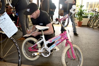 ©Barry Sandland/TIMB - Cyclo mechanic checking a bike in advance of the Velo Bourse at Cyclo, today.