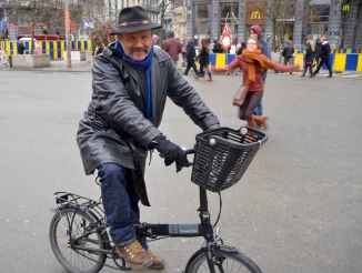 ©Barry Sandland/TIMB - Man on a folding bike in Brussels
