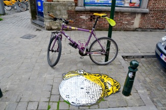 ©Barry Sandland/TIMB - My bike r4esting next to one of the Oakoak street art pieces in Brussels